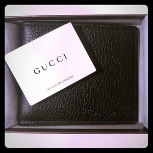 GUCCI Men's bi-fold black leather wallet 260987